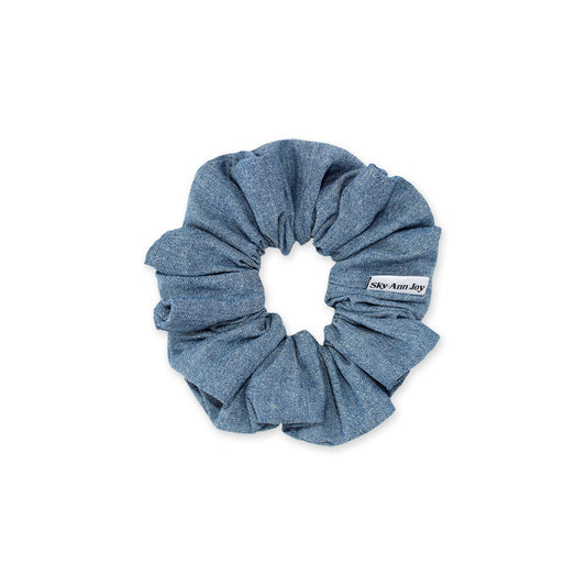 Light blue chambray hair scrunchie, soft and durable, perfect for everyday wear and stylish updos