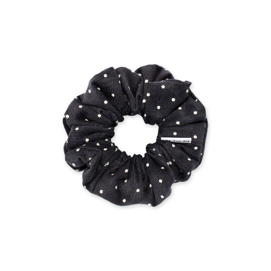 Black and white polka dot corduroy hair scrunchie, textured and cozy, great for adding warmth to fall and winter outfits
