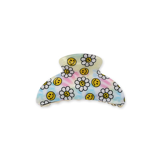 Rounded hair claw with daisy and yellow smiley faces on a tie dye background, perfect for tweens and teens