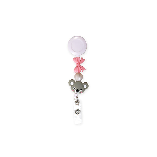 Koala face and pink bow silicone bead badge reel, retractable and no-slip grip, ideal for quick and easy access to work id