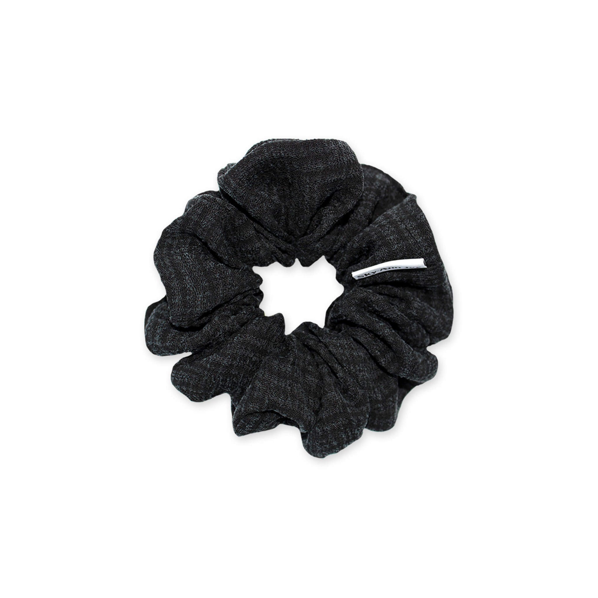 Black hair scrunchie made from Cupro fabric, luxurious and textured, perfect for adding a touch of elegance to formal outfits